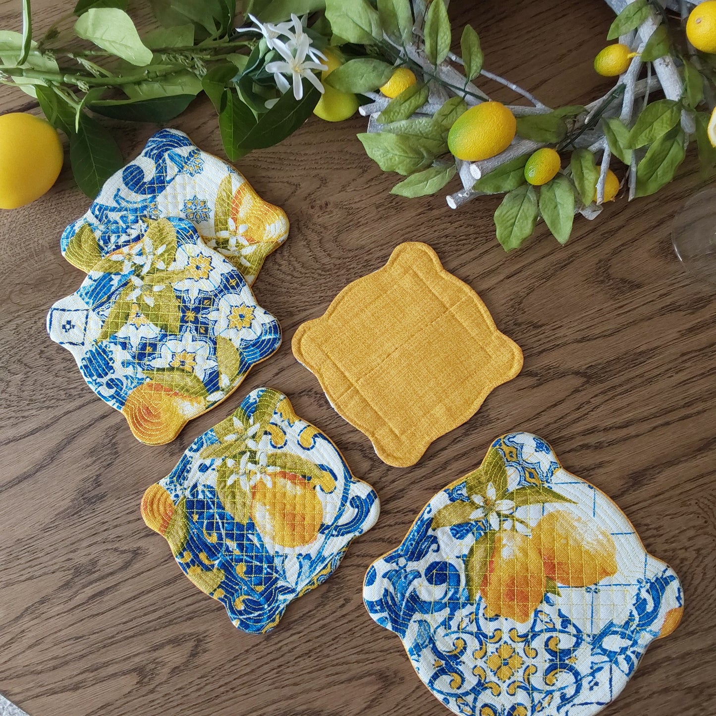 Set of coasters in lemon print fabric