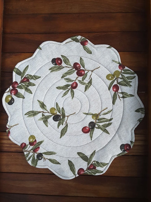 Round quilted placemat, scalloped edges olives print on beige