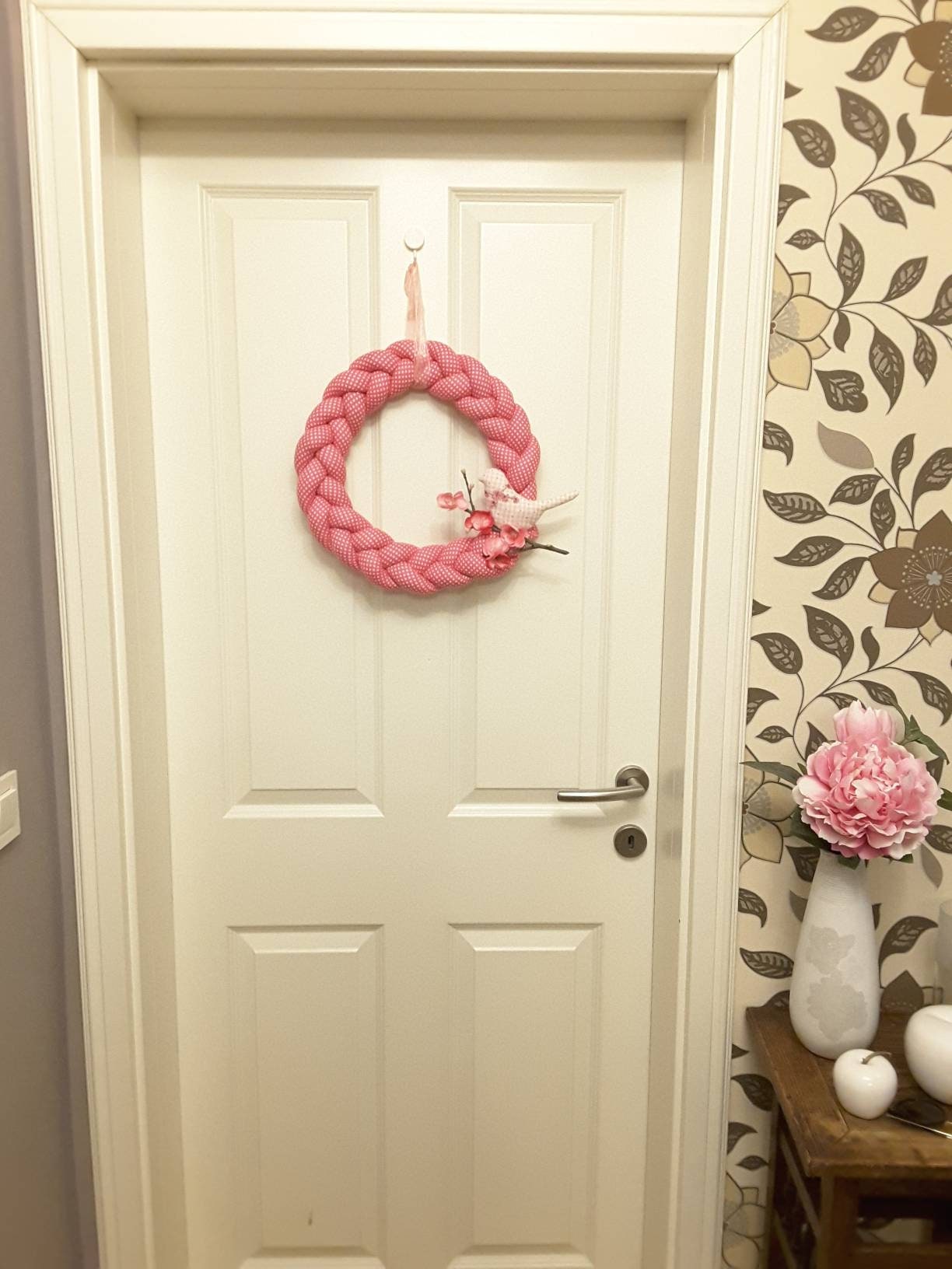 Pink Braided Fabric Wreathwith a Bird on a Cherry branch