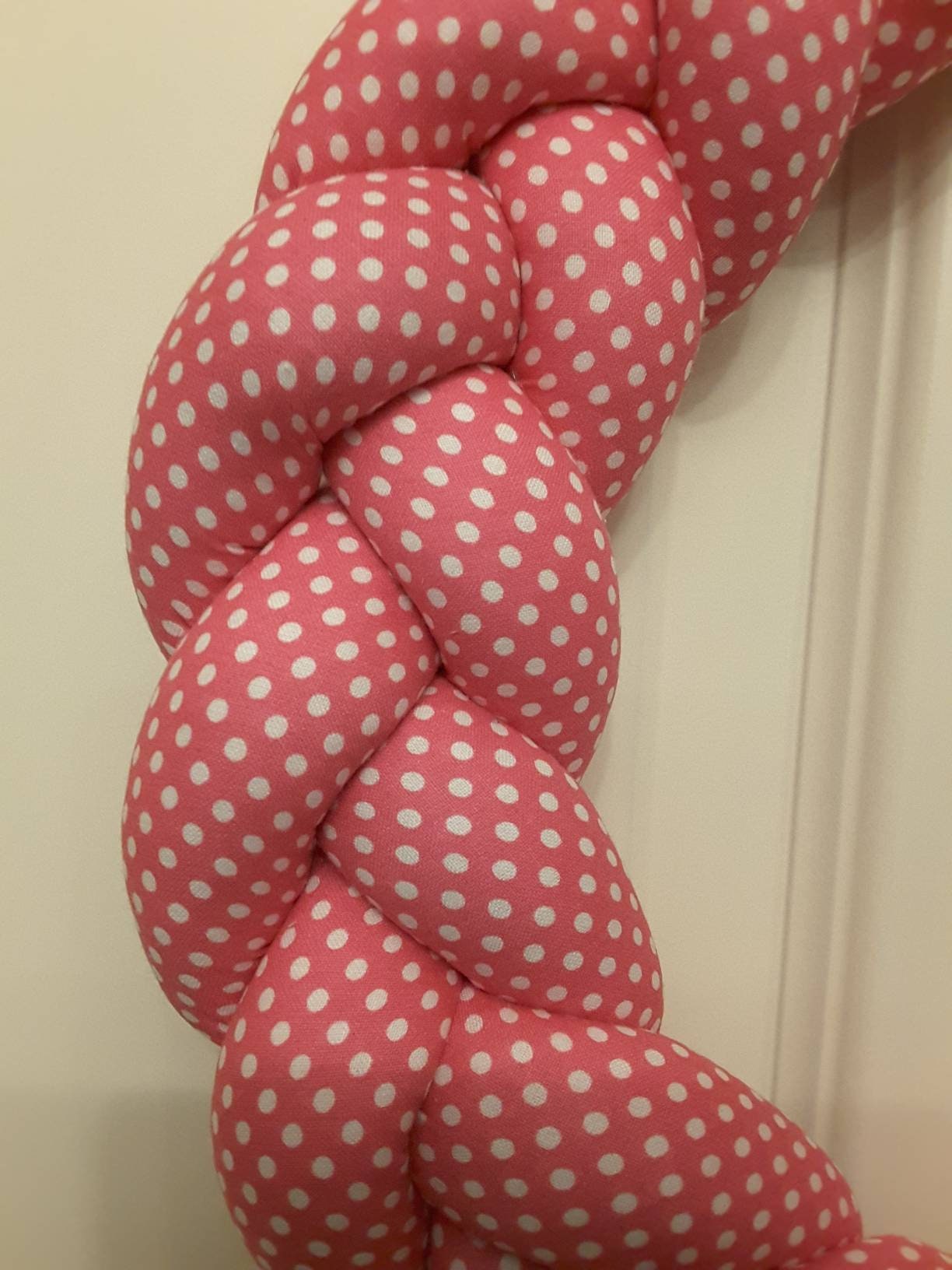 Pink Braided Fabric Wreathwith a Bird on a Cherry branch