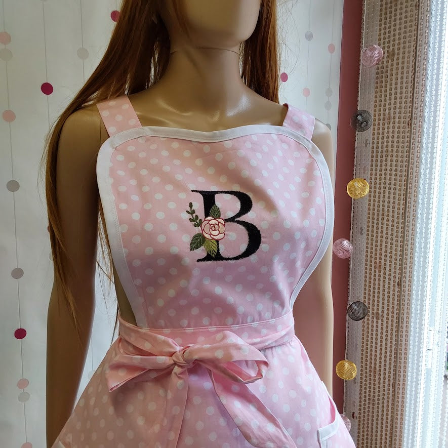 Pink polka dot apron, close up of a monogram embroidery on a bib, apron Barbara